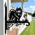 Keeshond metal hanging basket bracket mounted on outdoor wall for plant decoration