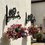 Keeshond metal hanging basket bracket mounted on outdoor wall for plant decoration