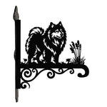 Keeshond metal hanging basket bracket mounted on outdoor wall for plant decoration