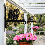 Keeshond metal hanging basket bracket mounted on outdoor wall for plant decoration