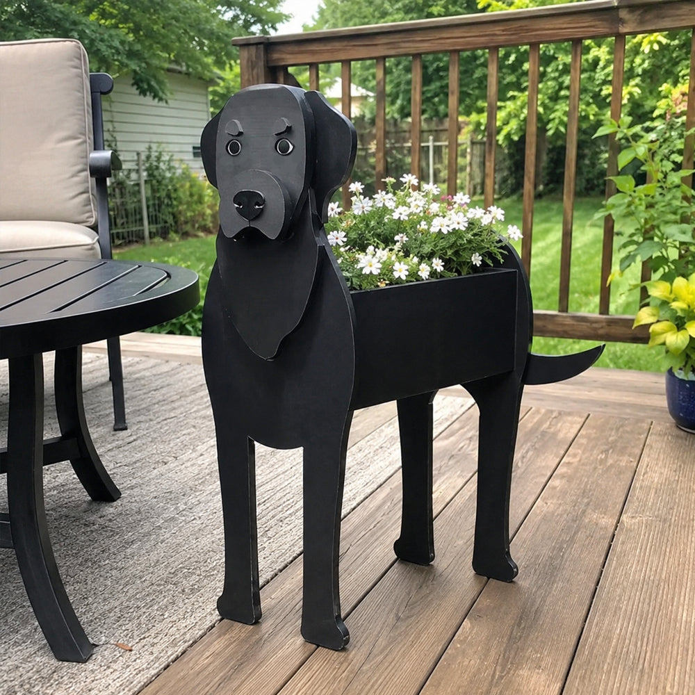 Labrador dog planter filled with fresh flowers is placed in the garden