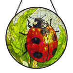 ladybug on green leaves stained glass suncatcher window hanging, suitable for home and garden decoration.