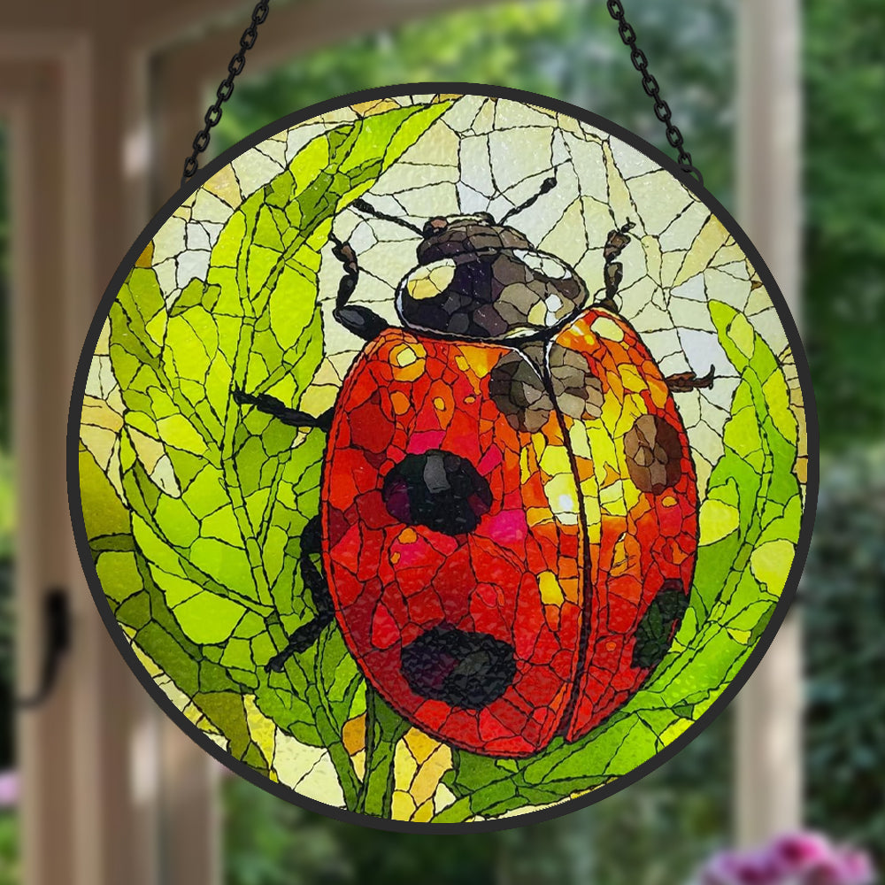 ladybug on green leaves stained glass suncatcher window hanging, suitable for home and garden decoration.