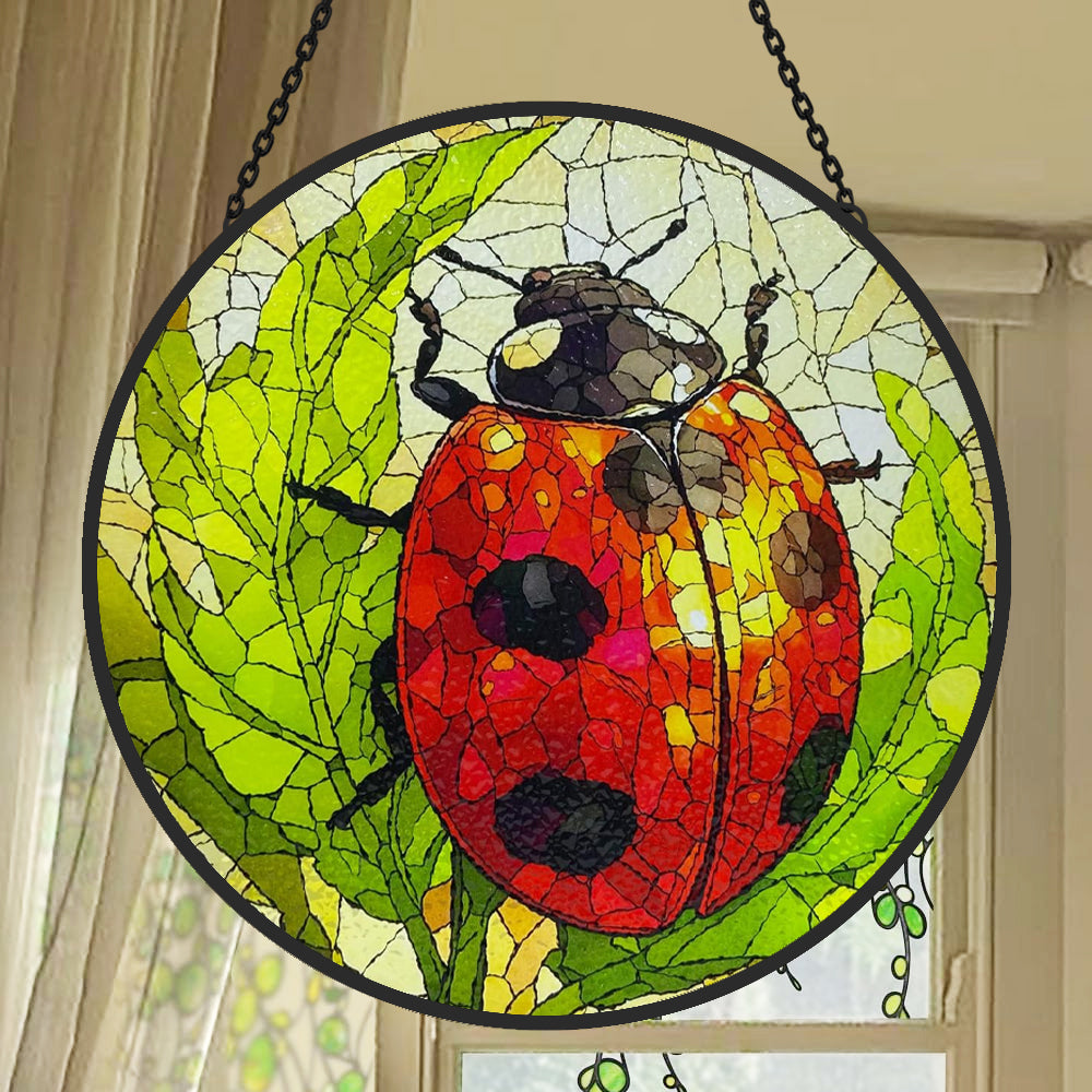ladybug on green leaves stained glass suncatcher window hanging, suitable for home and garden decoration.