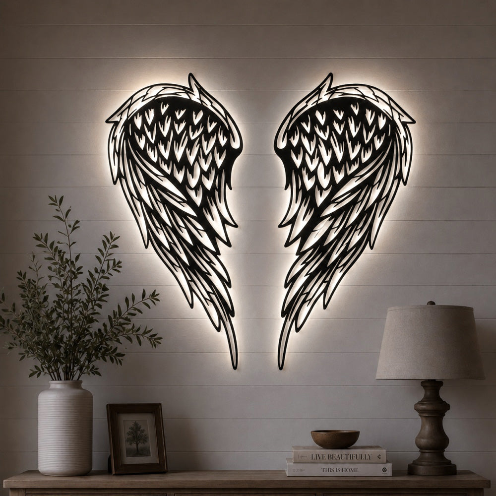 Black metal Layered Angel Wings wall art with Soft White LED Lighting displayed on the wall