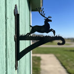 Leaping reindeer metal hanging basket bracket mounted on outdoor wall for plant decoration
