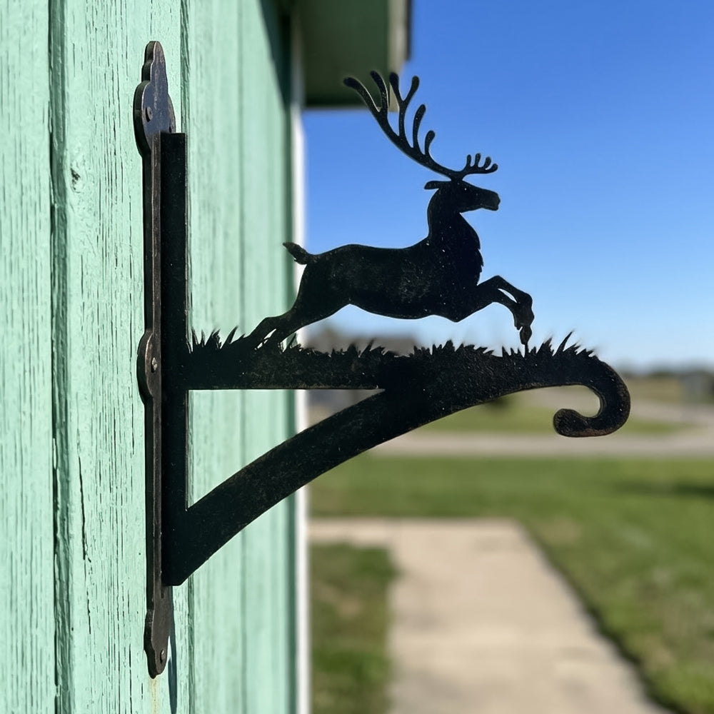 Leaping reindeer metal hanging basket bracket mounted on outdoor wall for plant decoration