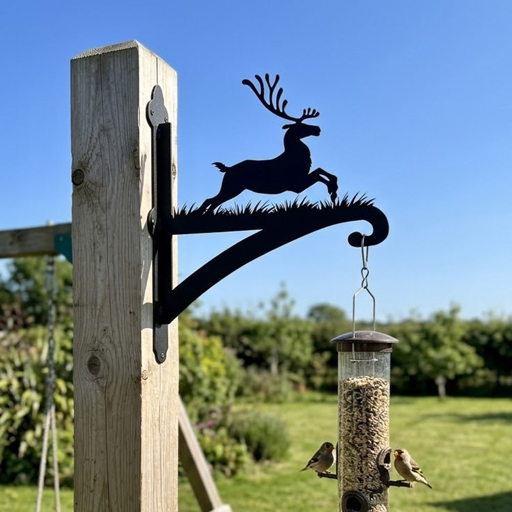 Leaping reindeer metal hanging basket bracket mounted on outdoor wall for plant decoration