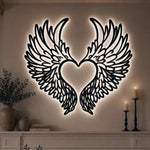 Black metal Love Angel wings wall art with Soft White LED Lighting displayed on the wall