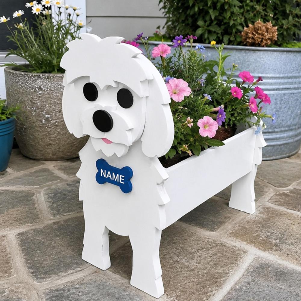 Maltese dog planter filled with fresh flowers is placed in the garden