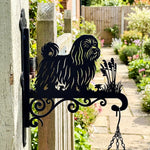Maltese metal hanging basket bracket mounted on outdoor wall for plant decoration