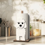 Maltese Wooden Dog Paper Towel Holder displayed on a kitchen countertop with a freestanding paper towel roll