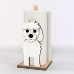 Maltese Wooden Dog Paper Towel Holder displayed on a kitchen countertop with a freestanding paper towel roll