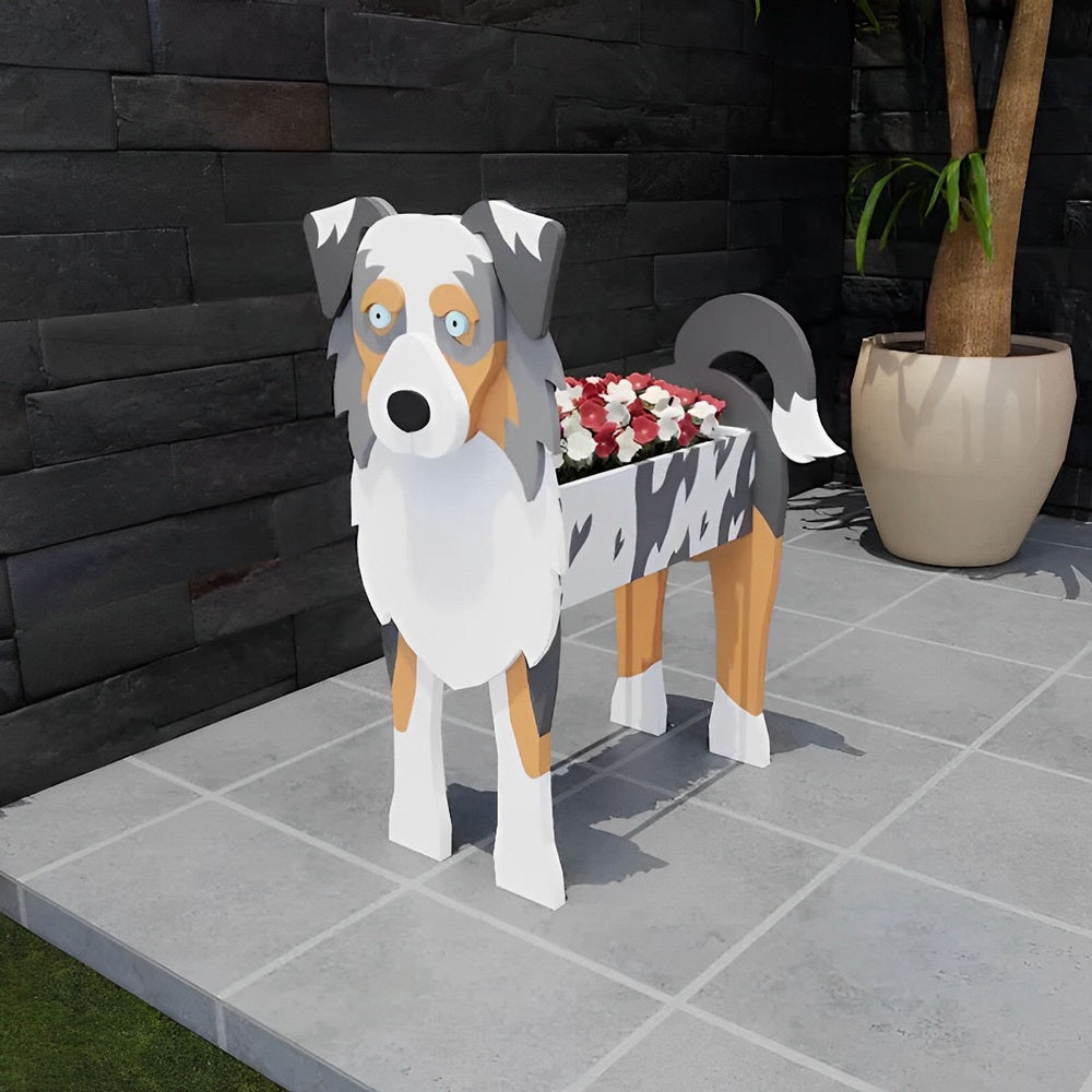 Blue Merle Border Collie dog planter filled with fresh flowers is placed in the room