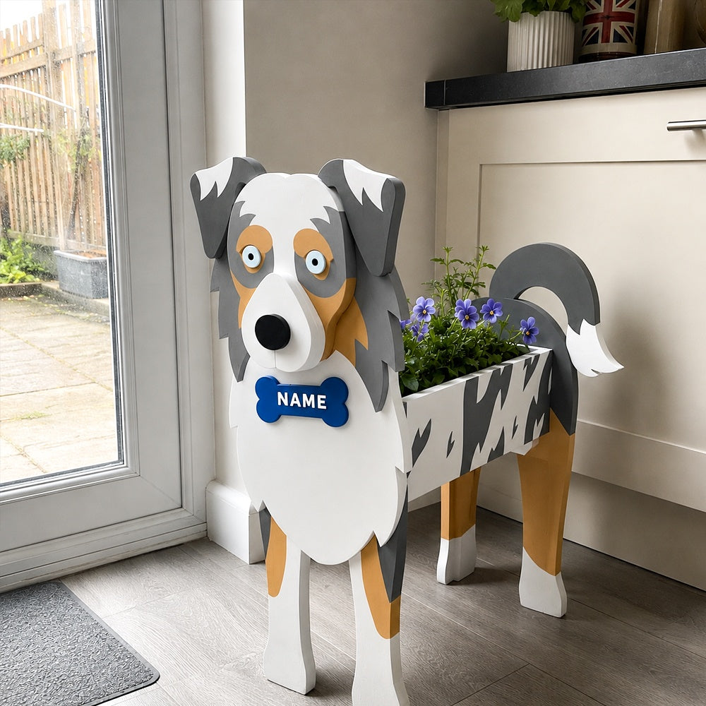 Blue Merle Border Collie dog planter filled with fresh flowers is placed in the room