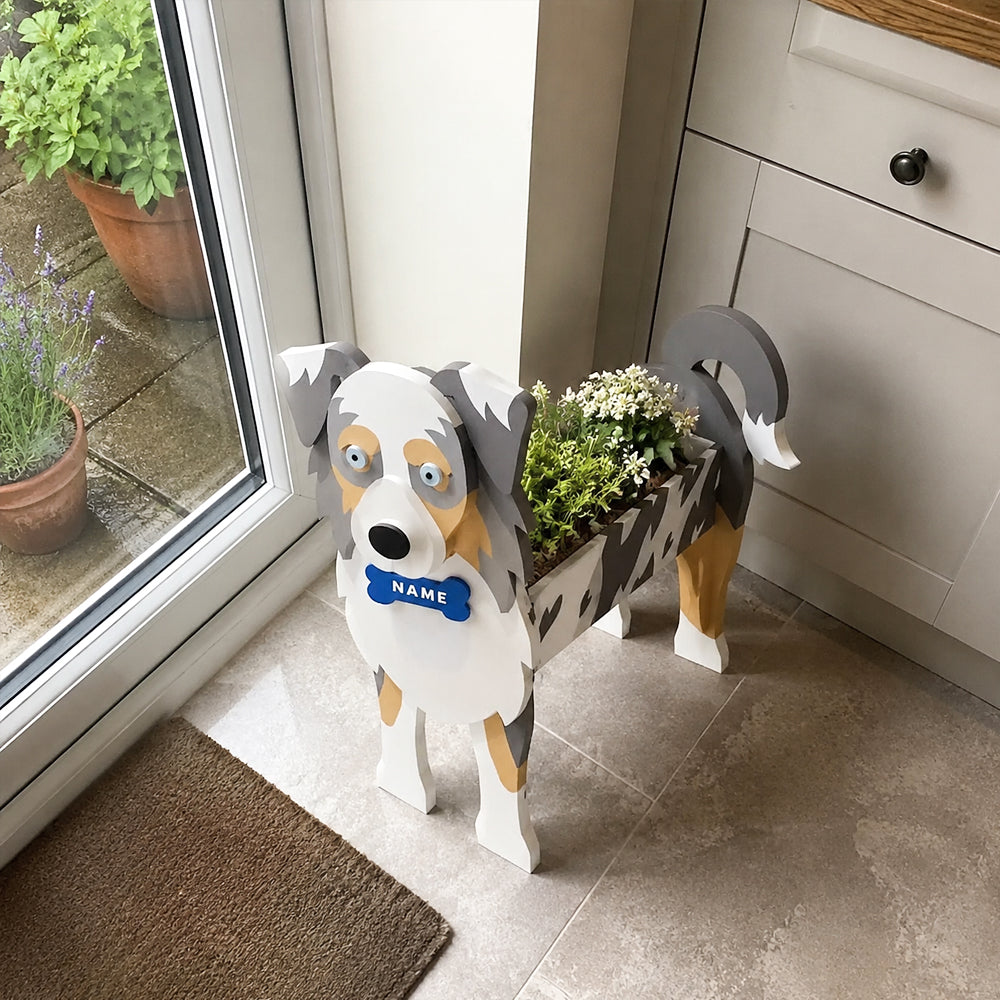 Blue Merle Border Collie dog planter filled with fresh flowers is placed in the room
