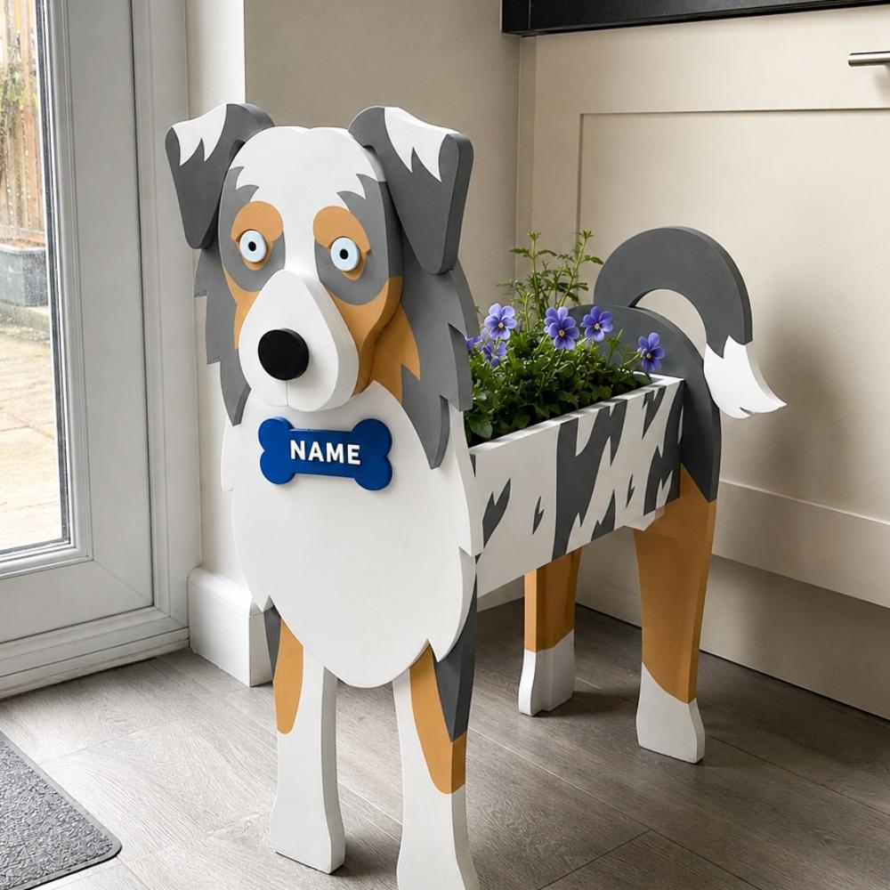 Blue Merle Border Collie dog planter filled with fresh flowers is placed in the room