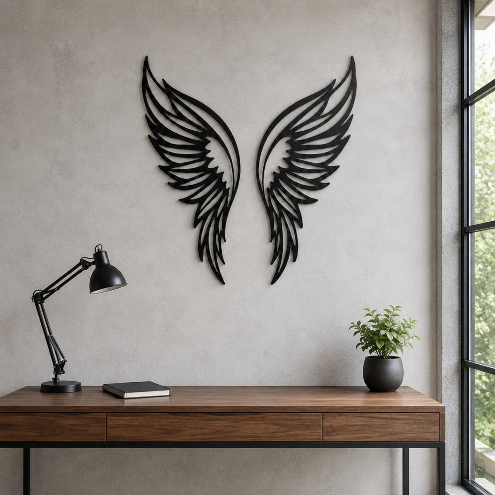 Black metal Butterfly wings wall art with intricate cutout details displayed on the wall