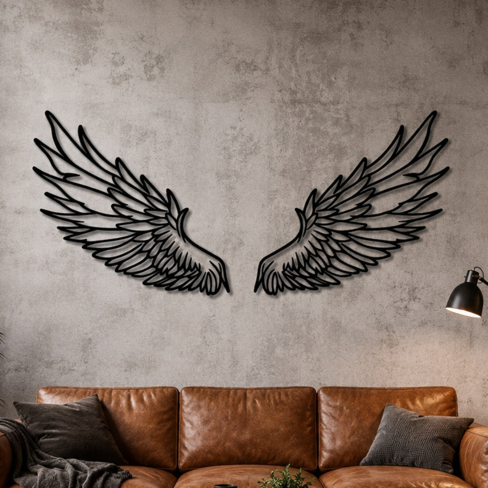 Black metal Celestial Angel wings wall art with intricate cutout details displayed on the wall