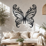 Black metal Elegant Butterfly wings wall art with intricate cutout details displayed on the wall