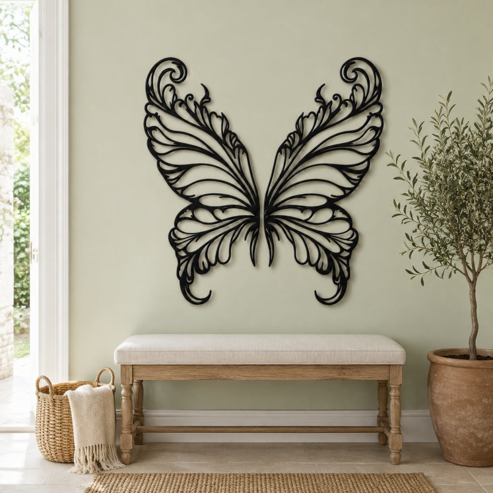 Black metal Elegant Butterfly wings wall art with intricate cutout details displayed on the wall