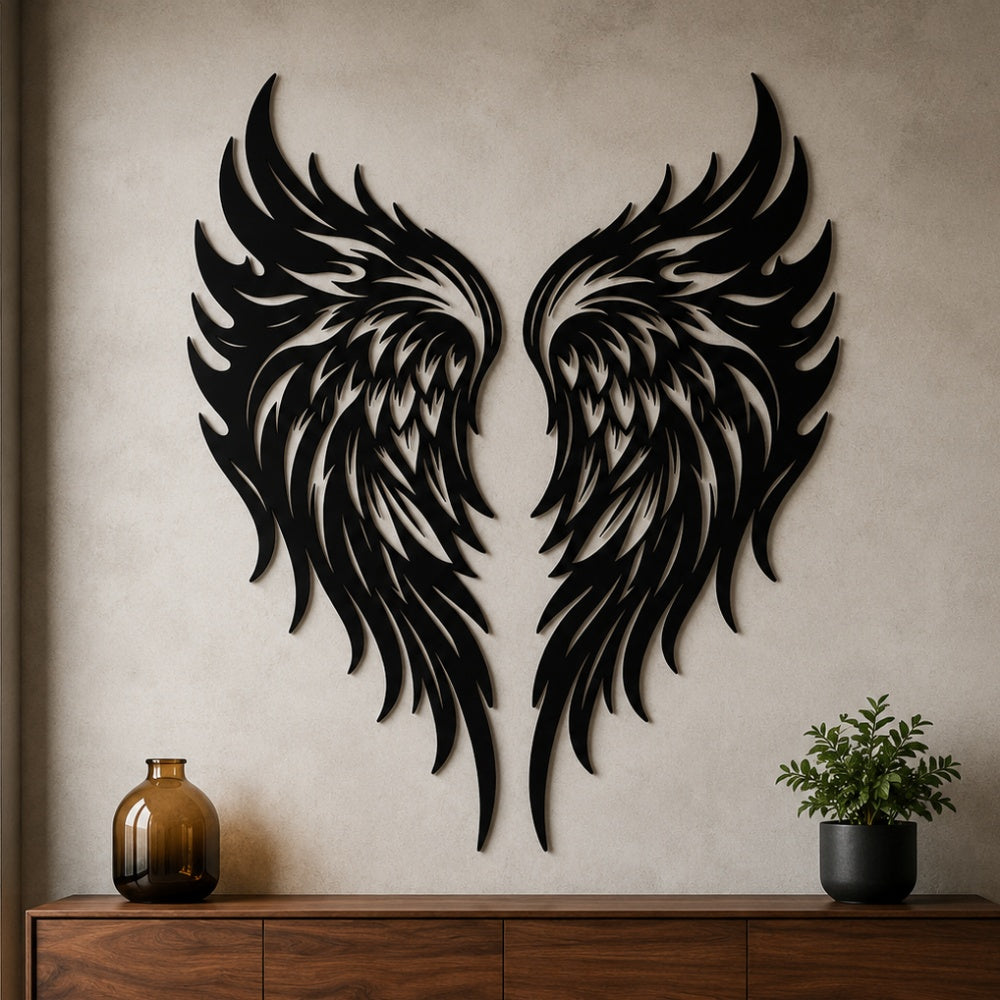 Black metal Flame Style Angel wings wall art with intricate cutout details displayed on the wall
