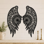 Black metal Floral Angel wings wall art with intricate cutout details displayed on the wall