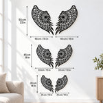 Black metal Floral Angel wings wall art with intricate cutout details displayed on the wall
