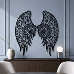 Black metal Floral Angel wings wall art with intricate cutout details displayed on the wall