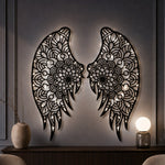 Black metal Floral Angel wings wall art with Soft White LED Lighting displayed on the wall