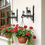 Miniature pinscher metal hanging basket bracket mounted on outdoor wall for plant decoration