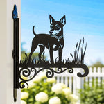 Miniature pinscher metal hanging basket bracket mounted on outdoor wall for plant decoration