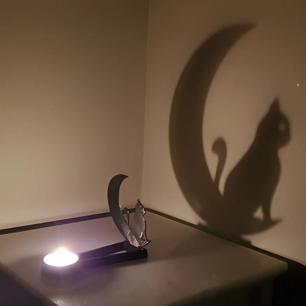 Moonlight cat halloween metal candle holder casting a spooky shadow on the wall