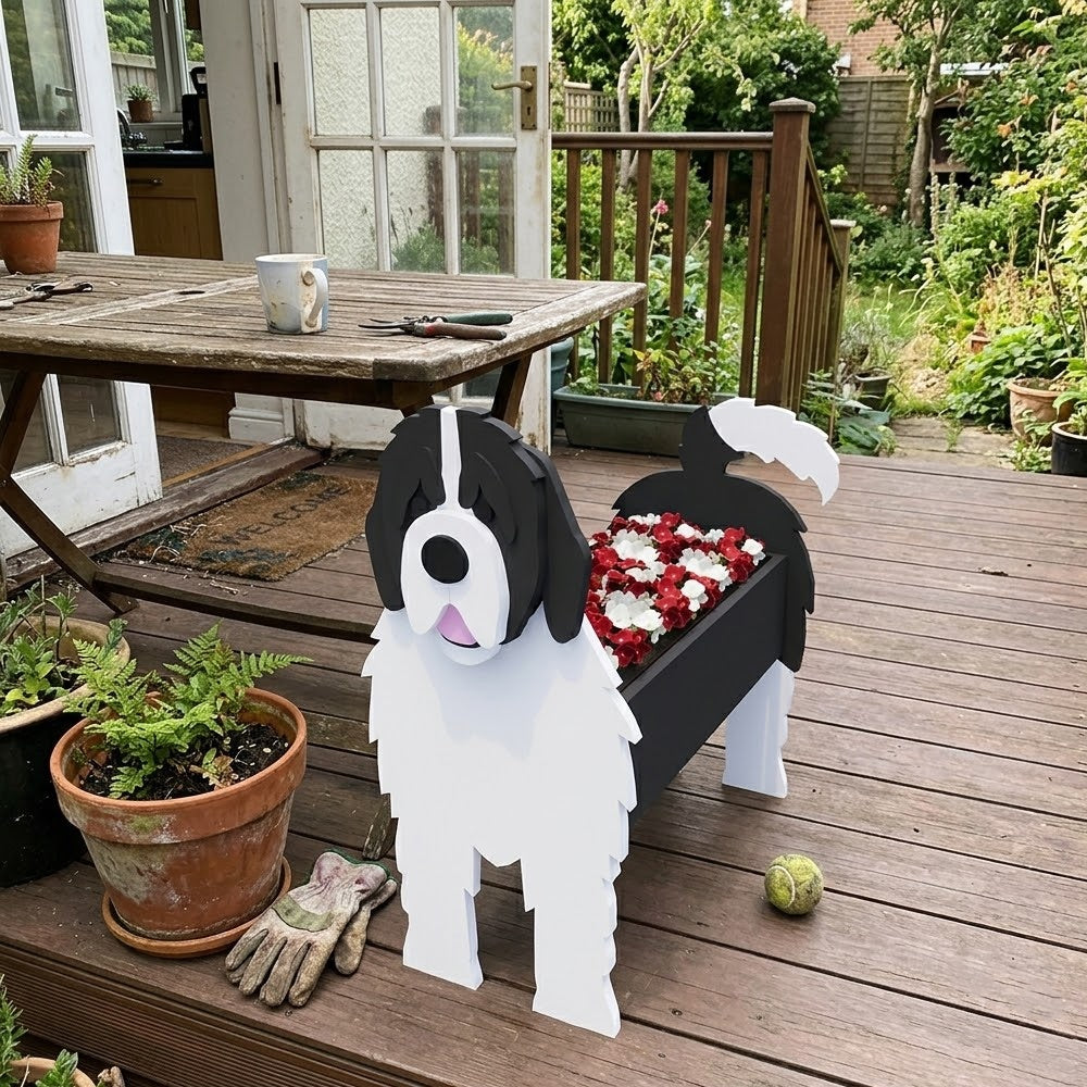 Newfoundland dog planter filled with fresh flowers is placed in the garden
