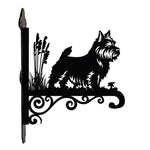 Norwich terrier metal hanging basket bracket mounted on outdoor wall for plant decoration