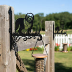 Old english sheepdog metal hanging basket bracket mounted on outdoor wall for plant decoration