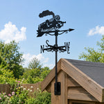 Old school locomotive metal weather vane with directional arrows and mounting rod, outdoor roof and garden decoration