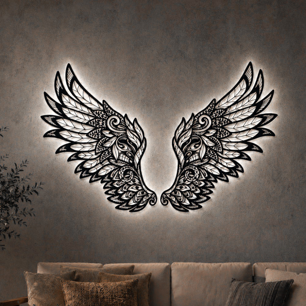 Black metal Ornate Angel wings wall art with Soft White LED Lighting displayed on the wall
