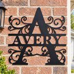 Personalized Initial Name Monogram metal wall sign displayed on the wall