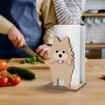 Pomeranian Wooden Dog Paper Towel Holder displayed on a kitchen countertop with a freestanding paper towel roll