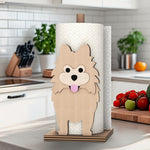 Pomeranian Wooden Dog Paper Towel Holder displayed on a kitchen countertop with a freestanding paper towel roll