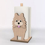 Pomeranian Wooden Dog Paper Towel Holder displayed on a kitchen countertop with a freestanding paper towel roll