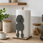 Poodle Wooden Dog Paper Towel Holder displayed on a kitchen countertop with a freestanding paper towel roll