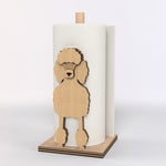 Poodle Wooden Dog Paper Towel Holder displayed on a kitchen countertop with a freestanding paper towel roll