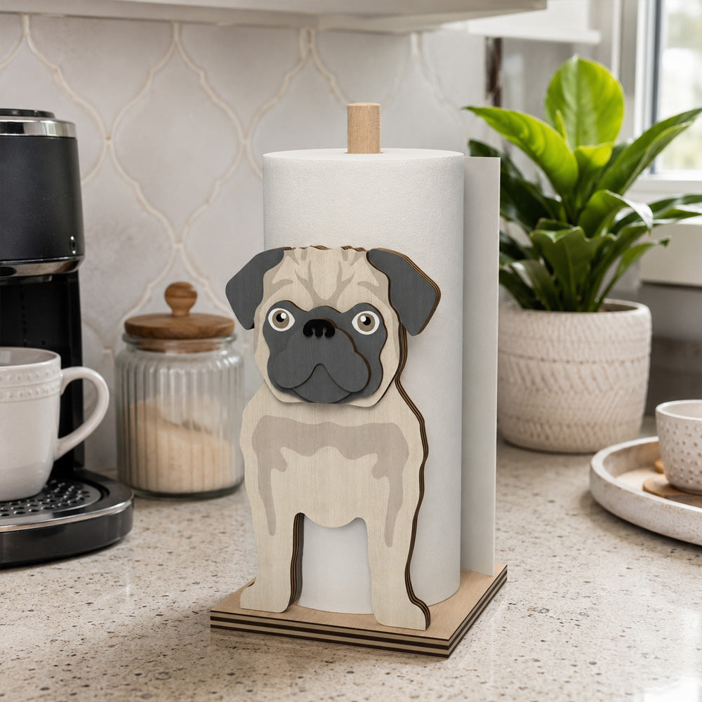 Pug Wooden Dog Paper Towel Holder displayed on a kitchen countertop with a freestanding paper towel roll