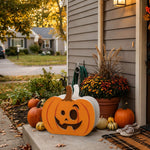 Halloween Planter Pumpkin planter filled with fresh flowers is placed in the garden