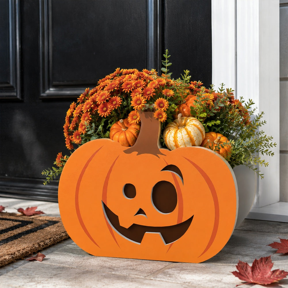 Halloween Planter Pumpkin planter filled with fresh flowers is placed in the garden