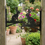 Rabbit metal hanging basket bracket mounted on outdoor wall for plant decoration