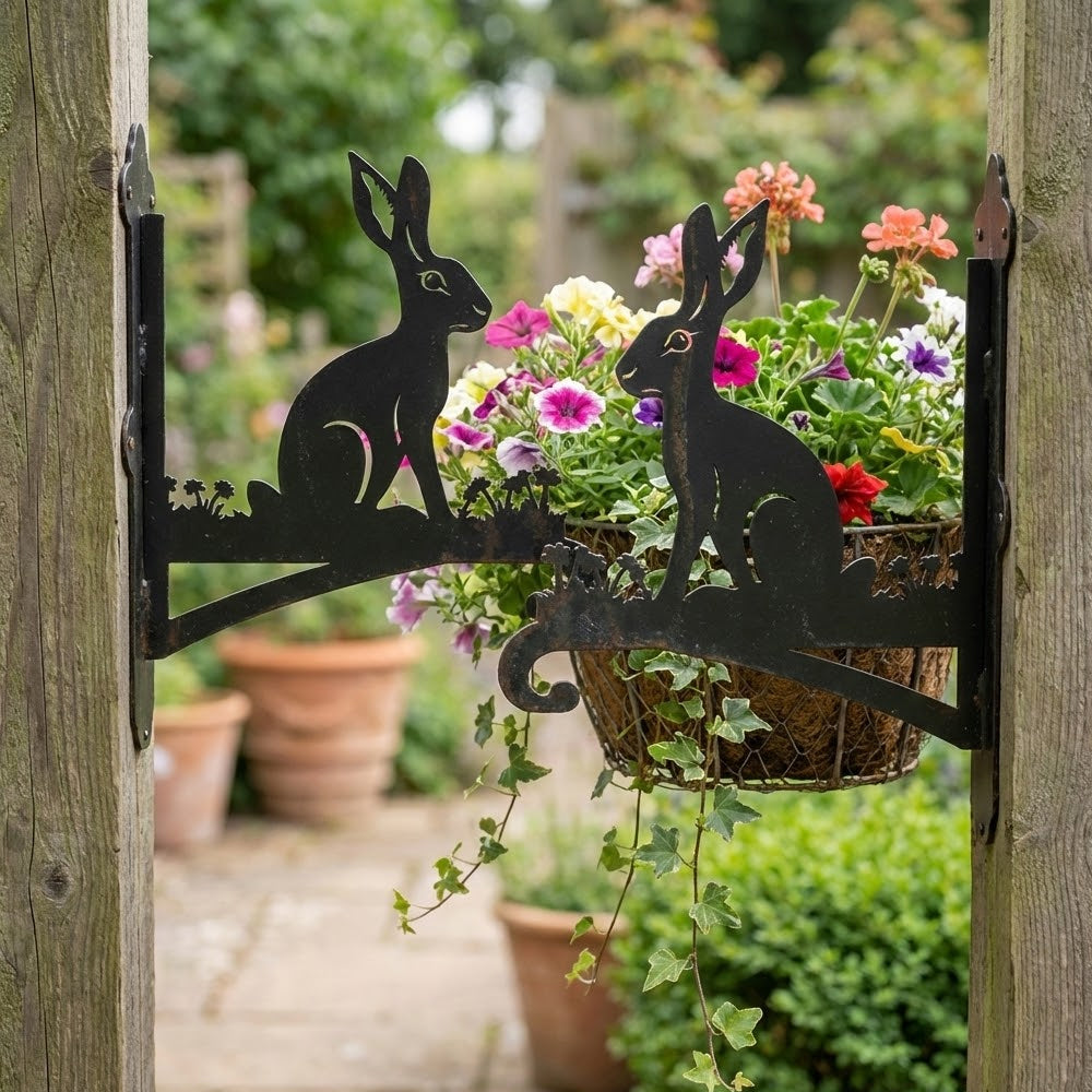 Rabbit metal hanging basket bracket mounted on outdoor wall for plant decoration