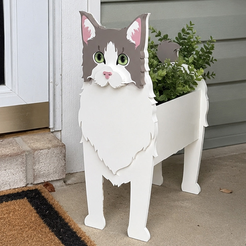 Ragdoll cat planter filled with fresh flowers is placed in the garden